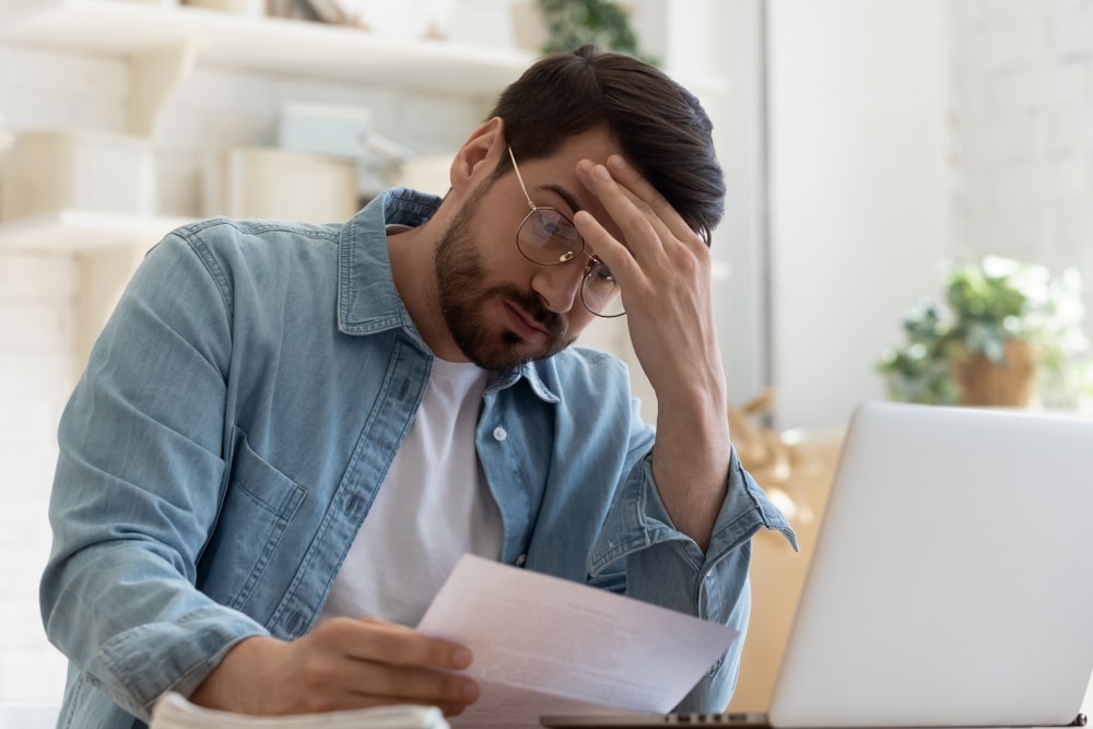 man upset after receiving postal mail