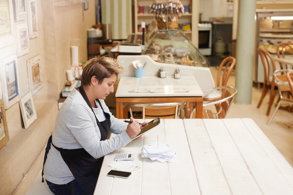 female entrepreneur doing taxes