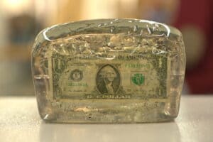 US dollar frozen in a block of ice