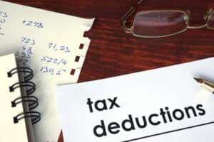 tax deductions written on a piece of paper